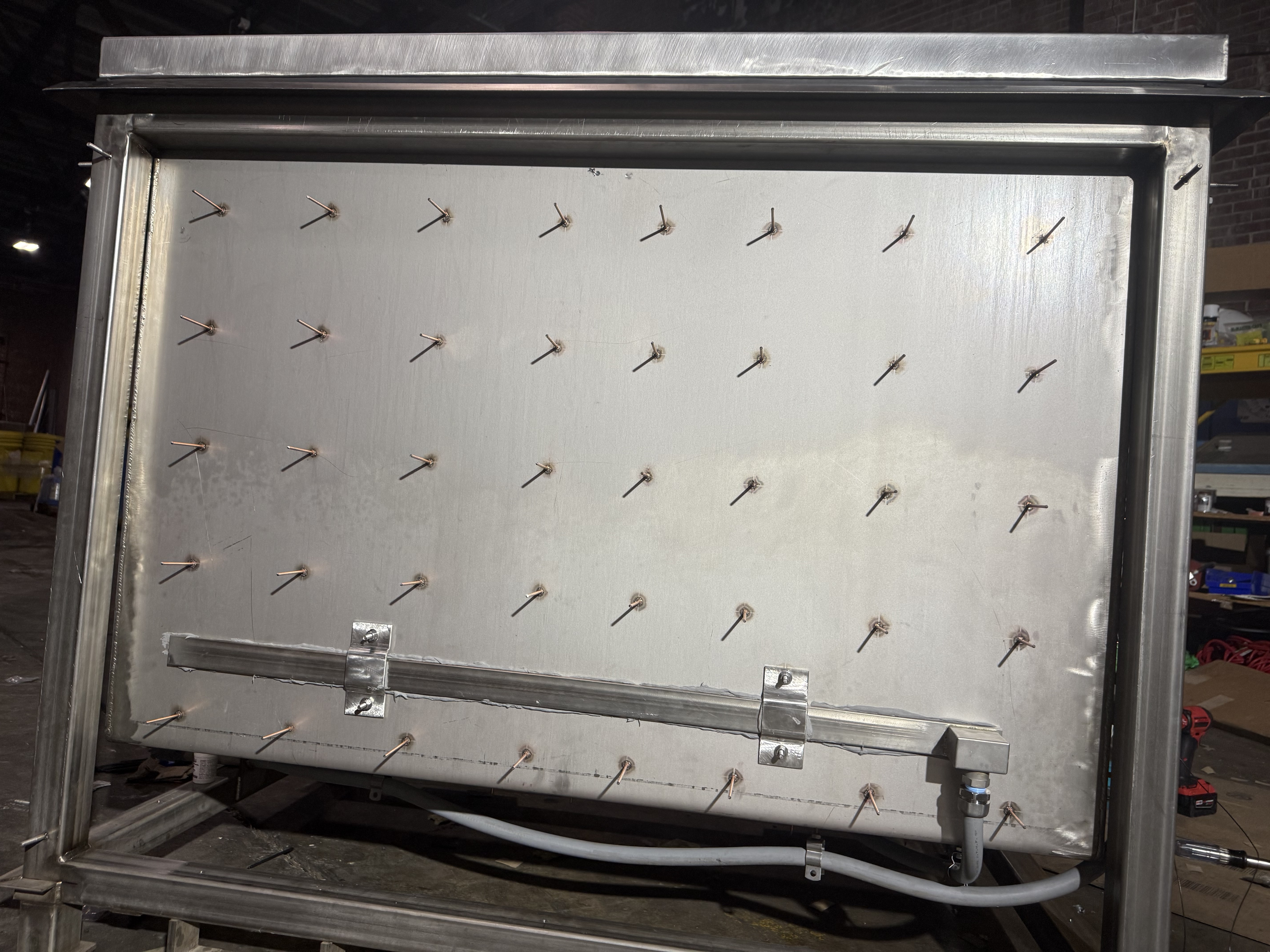 WL4 tank exterior showing insulated wall construction and heater mounting